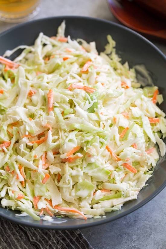 Order House Made Coleslaw food online from Holy Schnitzel store, Aventura on bringmethat.com