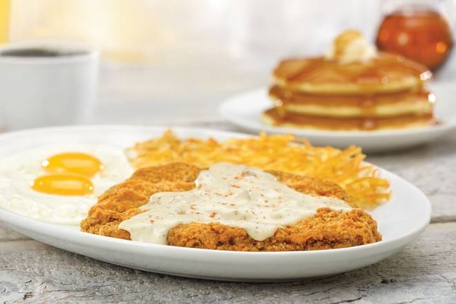 Order 1/2-lb. Chicken-Fried Steak & Eggs* food online from Village Inn Pancake House store, Tampa on bringmethat.com