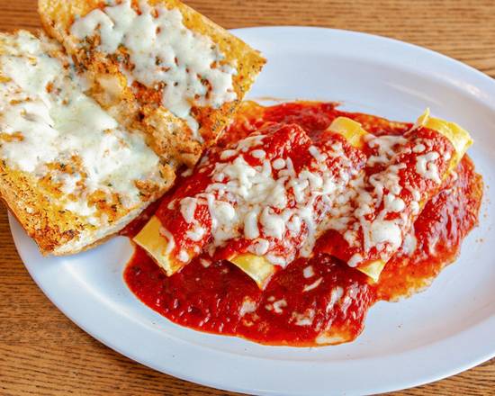 Order Baked Manicotti food online from Ameci Pizza & Pasta store, Los Angeles on bringmethat.com