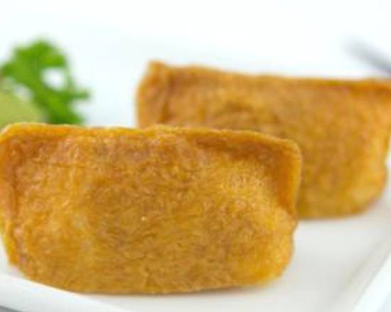 Order Tofu Skin (Inari) food online from Sushi Taku store, Chicago on bringmethat.com