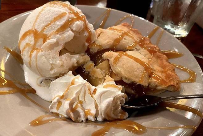 Order Mrs. Seltzer’s Scrumptious Hot Apple Pie Ala Mode food online from Harold Seltzer Steakhouse store, St. Petersburg on bringmethat.com
