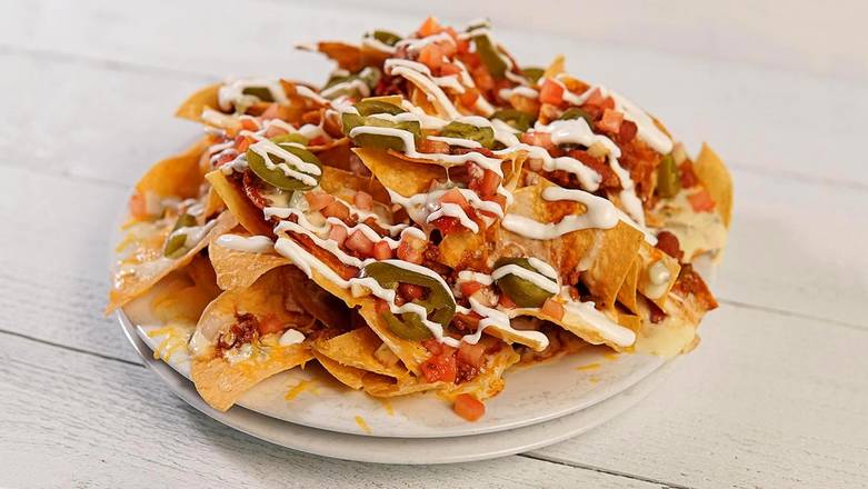 Order Nachos Deluxe food online from Hickory Tavern store, Holly Springs on bringmethat.com