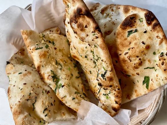 Order Garlic Naan food online from Crown Of India Tandoori Restaurant store, Los Angeles on bringmethat.com