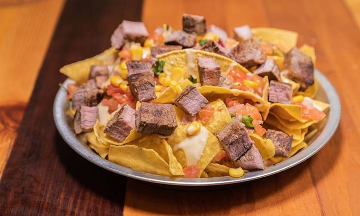 Order Steak Nachos food online from Xochimex Cantina Grill store, Miami on bringmethat.com