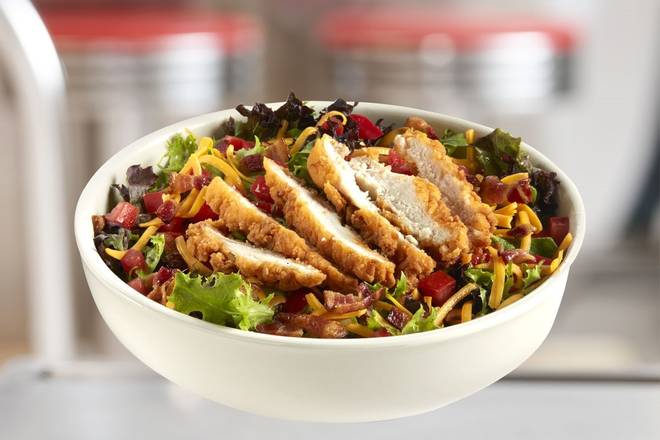 Order Crispy Chicken Club Salad food online from Johnny Rockets store, McAllen on bringmethat.com