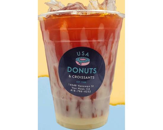 Order Iced Thai Milk Tea (24 oz) food online from USA Donuts store, Los Angeles on bringmethat.com