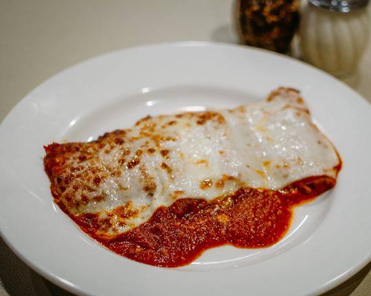 Order Melanzane Parmigiana food online from Stefano's Trattoria store, Winter Springs on bringmethat.com