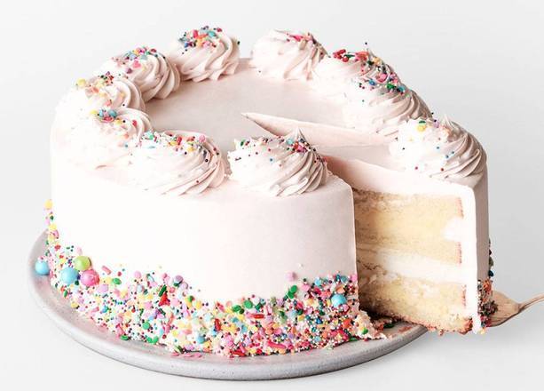 Order Slice Vanilla Creme Cake food online from Sweet Lady Jane Bakery store, Santa Monica on bringmethat.com