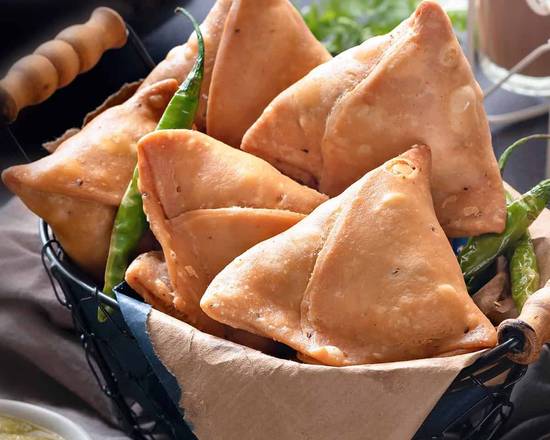 Order Triangles of Love – Veg food online from Desi Chops store, Terrace on bringmethat.com