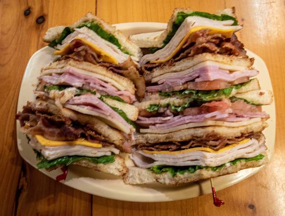 Order Deluxe Club Sandwich food online from Honeysuckle store, Titusville on bringmethat.com