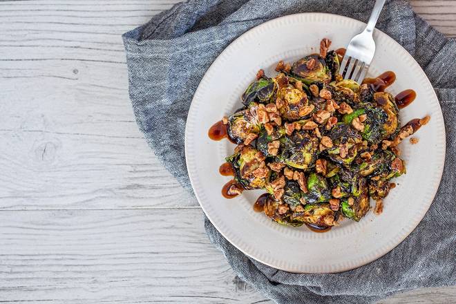 Order CRISPY BALSAMIC BRUSSEL SPROUTS food online from Gordon Biersch store, New Orleans on bringmethat.com