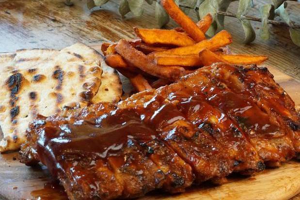 Order Whole Baby Back Ribs food online from The chicken shack catering store, New York on bringmethat.com