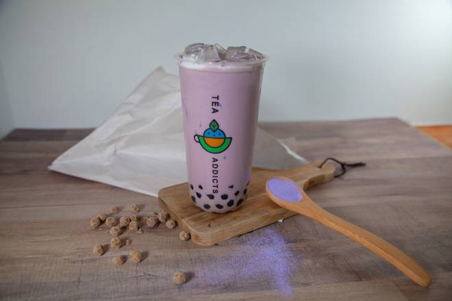 Order Taro Milk Tea food online from Tea Addicts store, Seattle on bringmethat.com