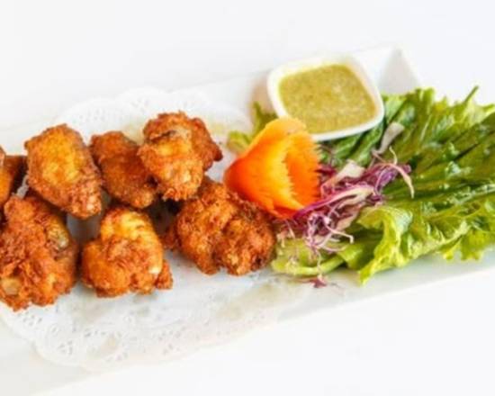 Order Thai Buffalo Wing (6pcs) food online from Emporium Thai Cuisine store, Los Angeles on bringmethat.com
