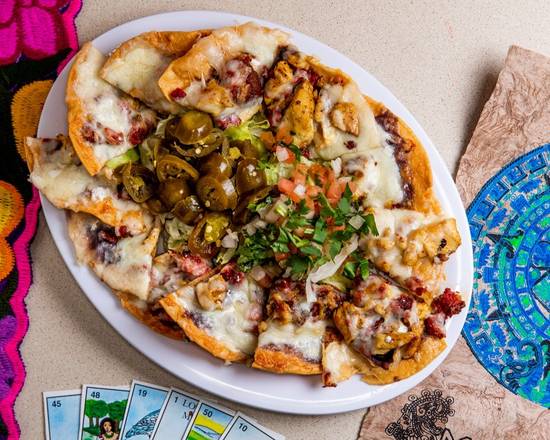 Order Chicken Nachos food online from Homemade Taqueria store, New York on bringmethat.com