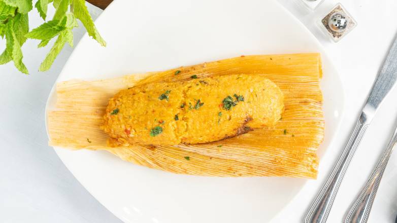 Order Cuban Pork Tamal food online from Geo's Cuban store, Seattle on bringmethat.com