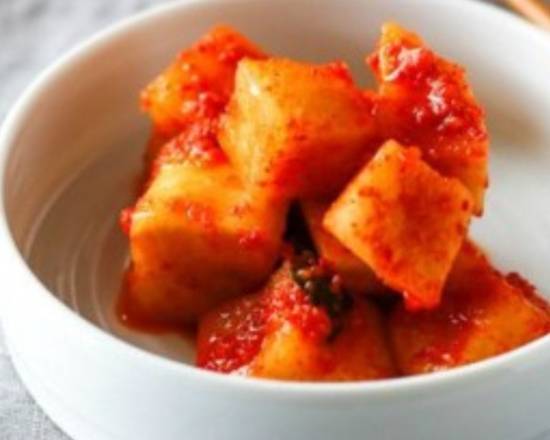 Order Radish Kimchi-Single Serving food online from Gangnam Korean Restaurant store, Jacksonville on bringmethat.com