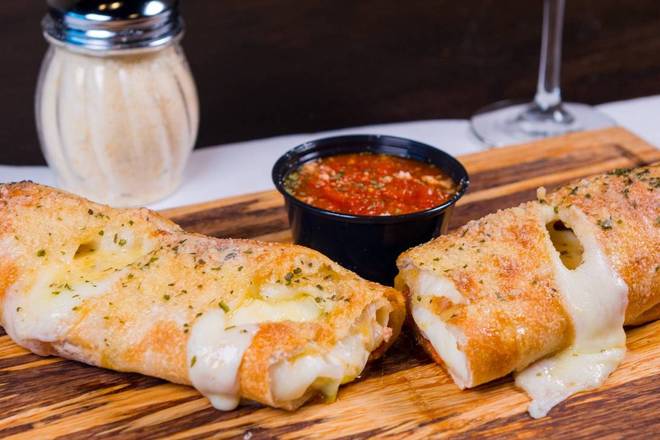Order Large Stromveggie food online from Emilios Pizzeria & Restaurante store, Saint Cloud on bringmethat.com