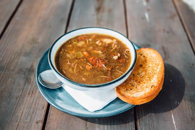 Order Duck and Andouille Gumbo Soup food online from Walk-On Sports Bistreaux store, Tallahassee on bringmethat.com