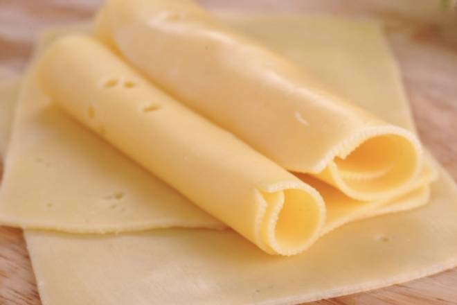 Order Queso Amarillo(americano) food online from Arepa One store, Hialeah on bringmethat.com