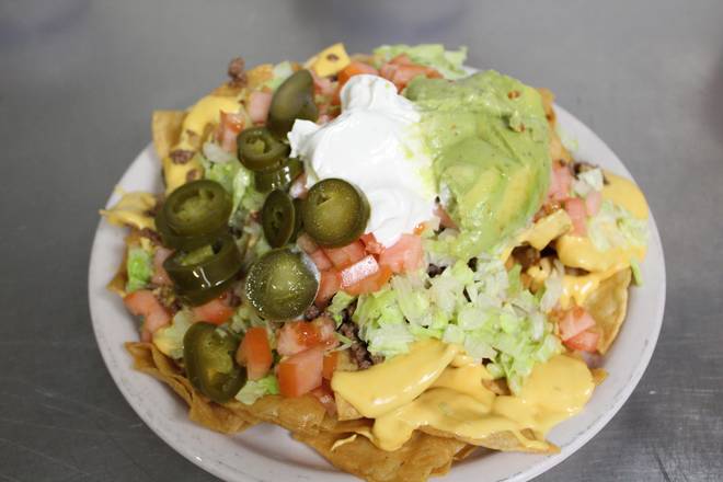 Order Nachos food online from Cousins Pizza Pub store, ROSELLE on bringmethat.com