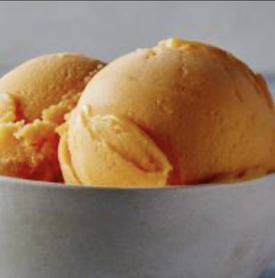 Order Mango Sorbet food online from Haagen Dazs Shop store, Woodbury on bringmethat.com