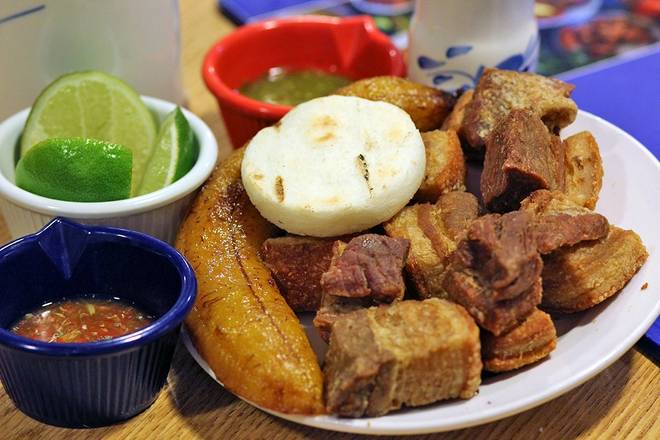Order Chicharrón food online from Mondongo's Restaurant store, Doral on bringmethat.com