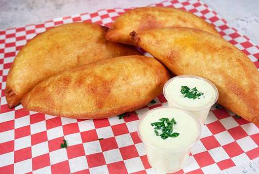 Order Empanada de Pabellón / Venezuelan Style food online from Venezuelan house store, Miami on bringmethat.com