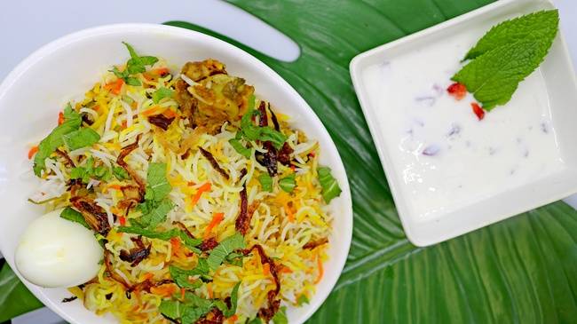 Order Chicken Dum Biryani food online from Ritha Indian Restaurant store, Foster City on bringmethat.com