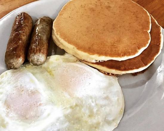 Order 2 Pancakes & 2 Eggs food online from Zachary's Restaurant store, Cape Canaveral on bringmethat.com