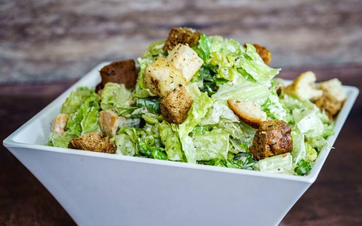 Order Caesar Salad food online from Holy Schnitzel store, Roseland on bringmethat.com
