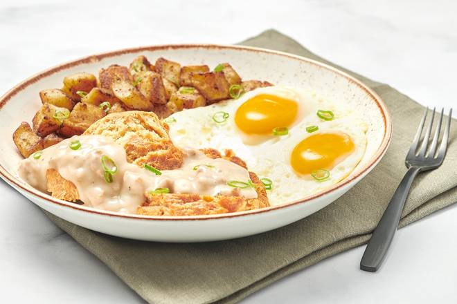 Order Biscuits & Turkey Sausage Gravy with Eggs food online from First Watch store, Osage Beach on bringmethat.com