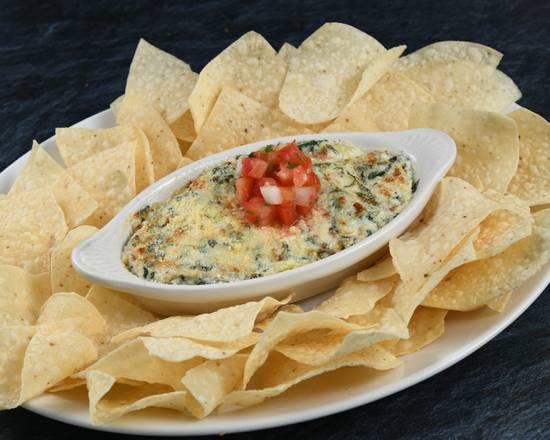 Order Spinach & Artichoke Dip* food online from Rainforest Cafe - Galveston store, Galveston on bringmethat.com