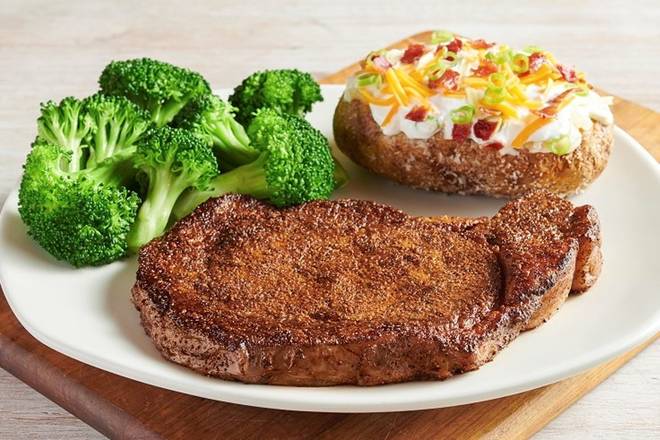 Order Ribeye* food online from Outback Steakhouse store, Daly City on bringmethat.com