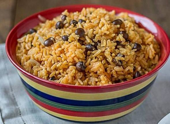 Order Rice with Gandules (Arroz con Gandules) - 24 oz food online from Maikel Kitchen store, Fort Myers on bringmethat.com