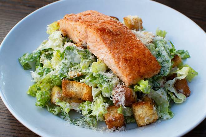 Order Charlotte's Salmon Caesar Salad food online from Bad Daddy's Burger Bar store, Greenville on bringmethat.com