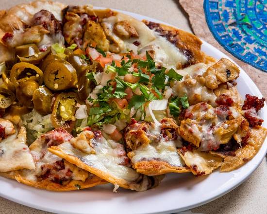 Order Steak Nachos food online from Homemade Taqueria store, New York on bringmethat.com