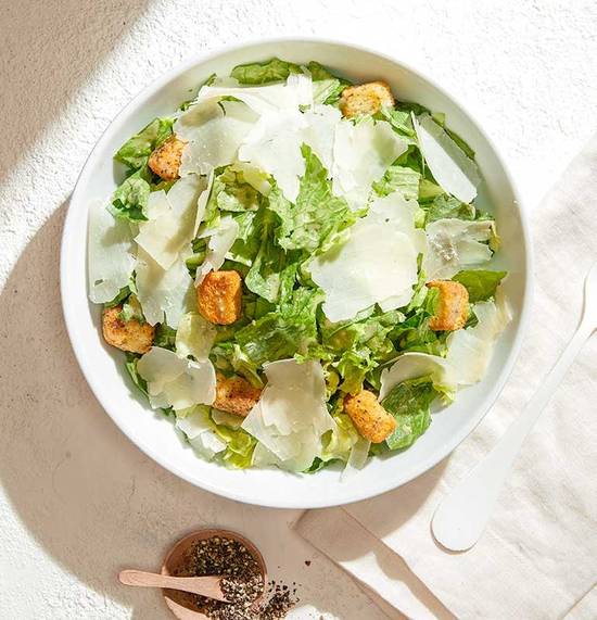 Order CLASSIC CAESAR food online from California Pizza Kitchen store, Orlando on bringmethat.com