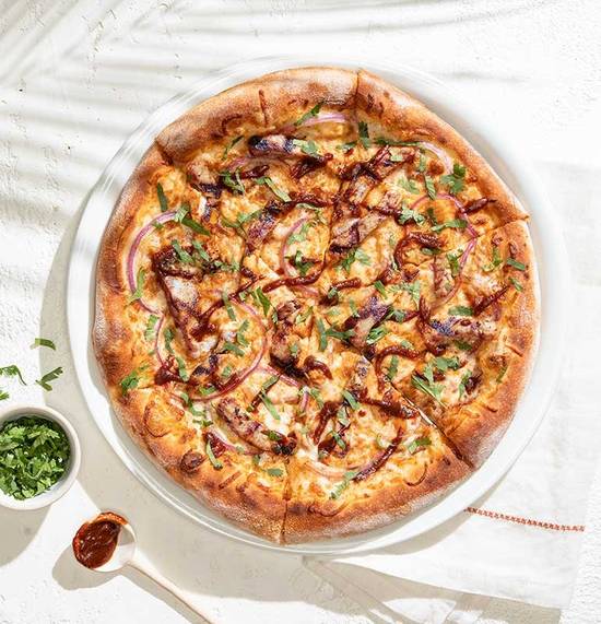 Order THE ORIGINAL BBQ CHICKEN PIZZA  food online from California Pizza Kitchen store, Tarzana on bringmethat.com