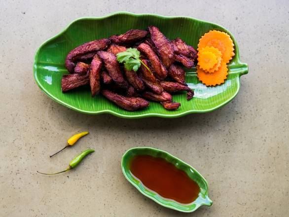 Order Moo Tod (Pork Jerky) food online from Celadon Thai Kitchen store, Los Angeles on bringmethat.com