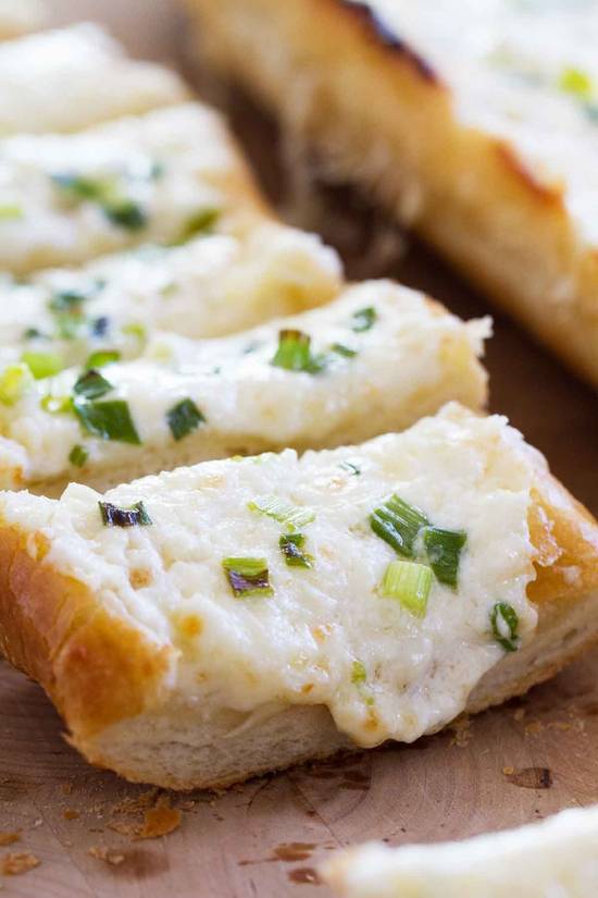 Order GARLIC BREAD W CHEESE food online from Portofino italian restaurant store, Charlotte on bringmethat.com