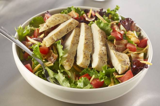Order Grilled Chicken Club Salad food online from Johnny Rockets store, McAllen on bringmethat.com