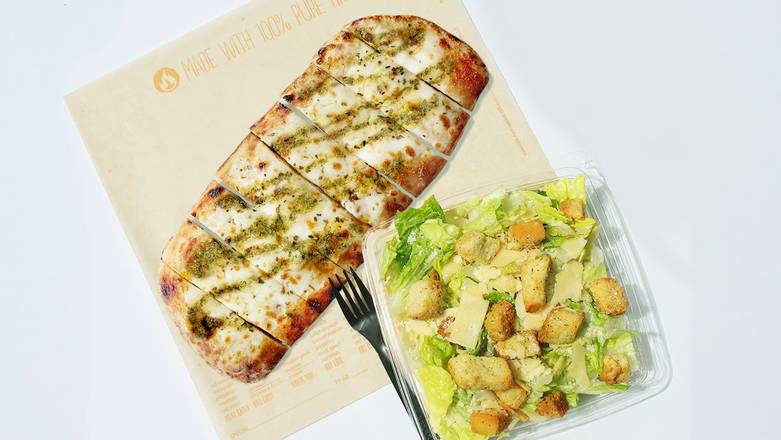 Order Pesto Garlic Cheesy Bread + choice of side food online from Blaze Pizza store, Bakersfield on bringmethat.com