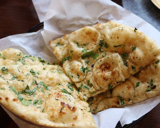 Order Garlic Naan food online from Mehak India Aroma store, Denver on bringmethat.com