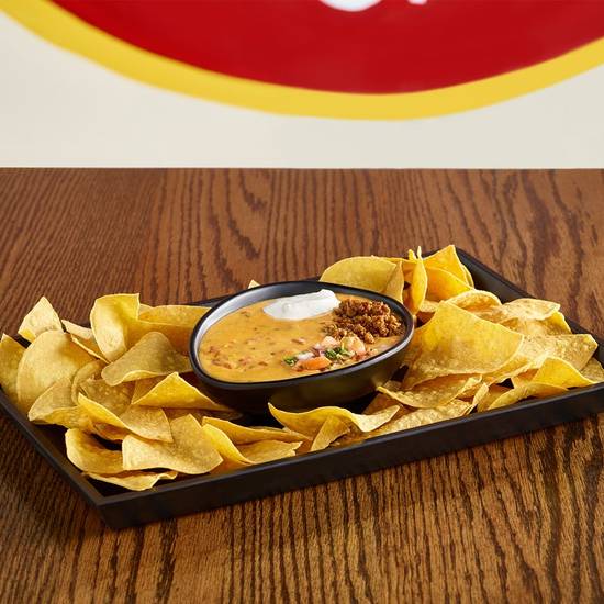 Order Queso - Quart food online from Wild Wing Cafe store, Greenville on bringmethat.com