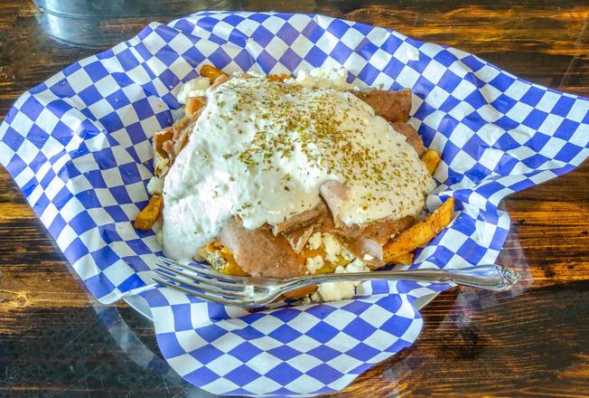 Order Loaded Greek Fries food online from Think Greek- Port St Lucie store, Port St. Lucie on bringmethat.com