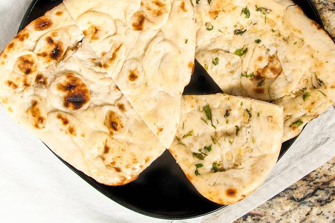 Order Plain Naan food online from Curry In Hurry store, Austin on bringmethat.com
