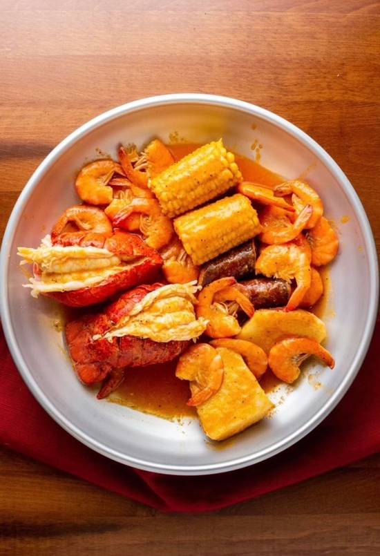Order Lobster Combo food online from Cravin Cajun Seafood store, Lakeland on bringmethat.com