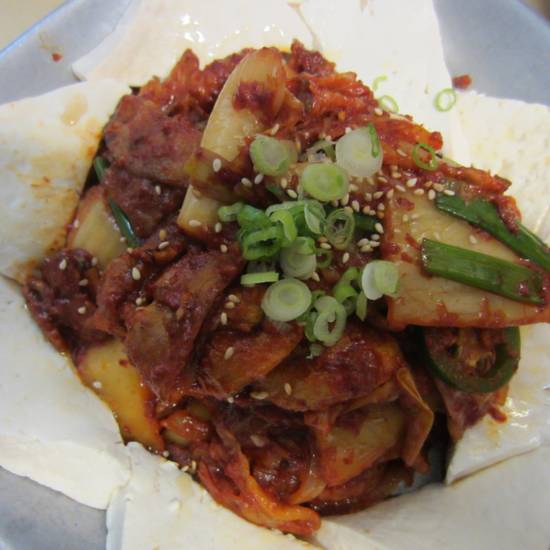 Order Stir Fried Kimchi with Pork served with Tofu food online from Kitchen Sooda store, Los Angeles on bringmethat.com