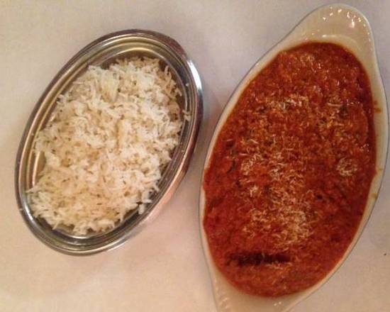 Order Lamb Goa food online from Nirvana store, New Orleans on bringmethat.com